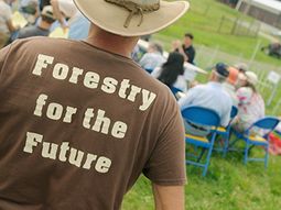 Man wearing a Forestry for the future t-shirt